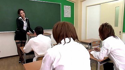 The sexy asian professor sucks off some of her students before finishing up in a horny clinic