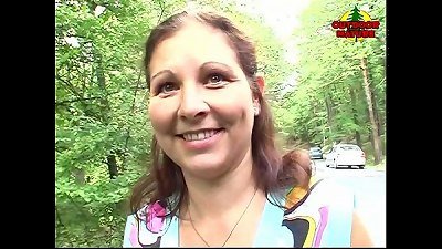 big-boobed older sucking off two dicks outdoor