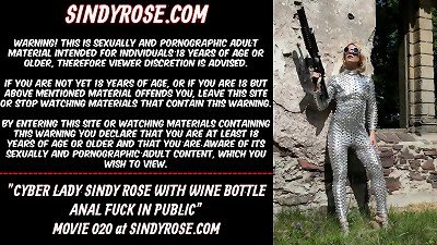 Cyber female Sindy Rose with champagne bottle assfuck pound in public
